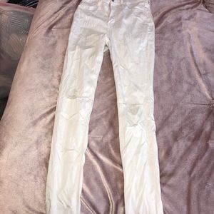 White ripped knee jeans